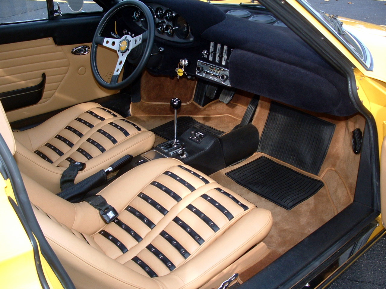 1973 246 GTS. Fly yellow with tan interior.